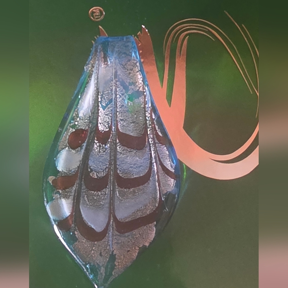 Elegant Glass Pendant with Silver and Red Accents